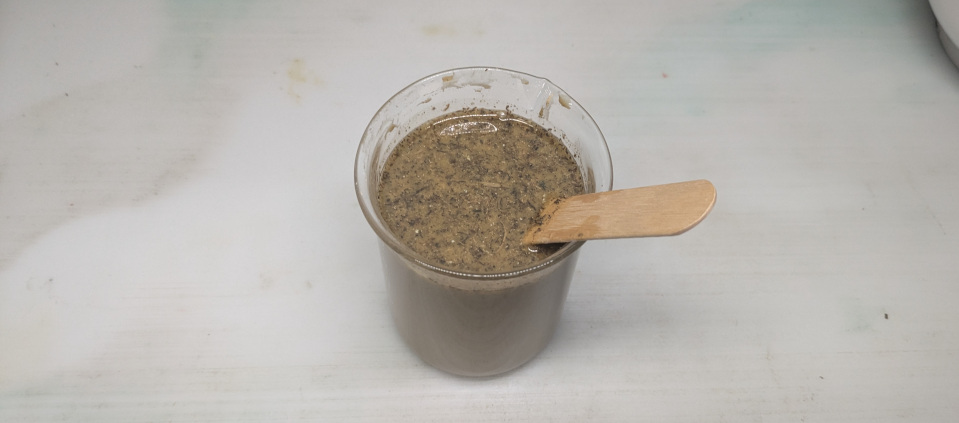 Beaker full of acidic dirt