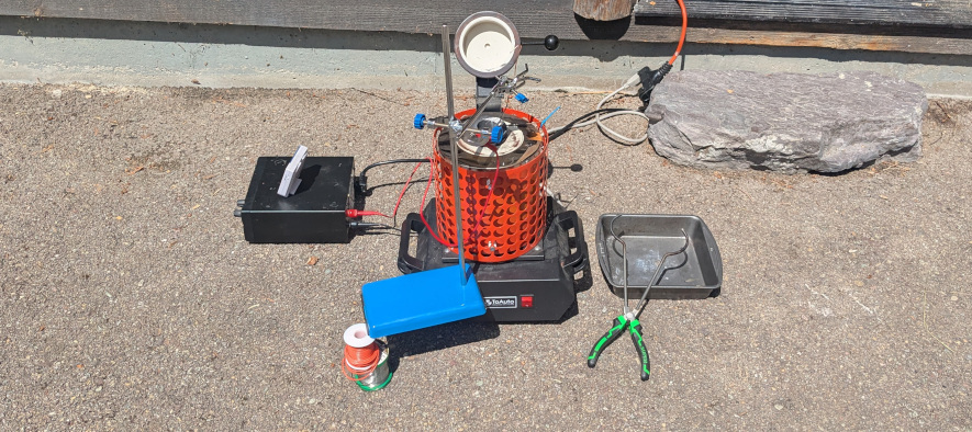 Electrolysis cell held together by hopes and dreams.