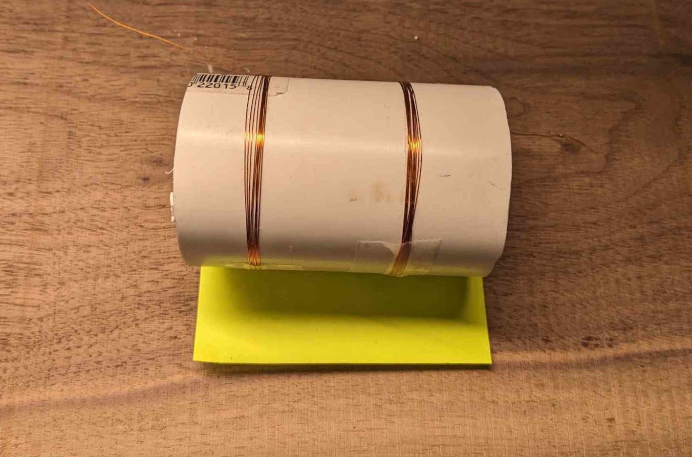 Photo showing 2 coils would onto a section of scrap PVC pipe