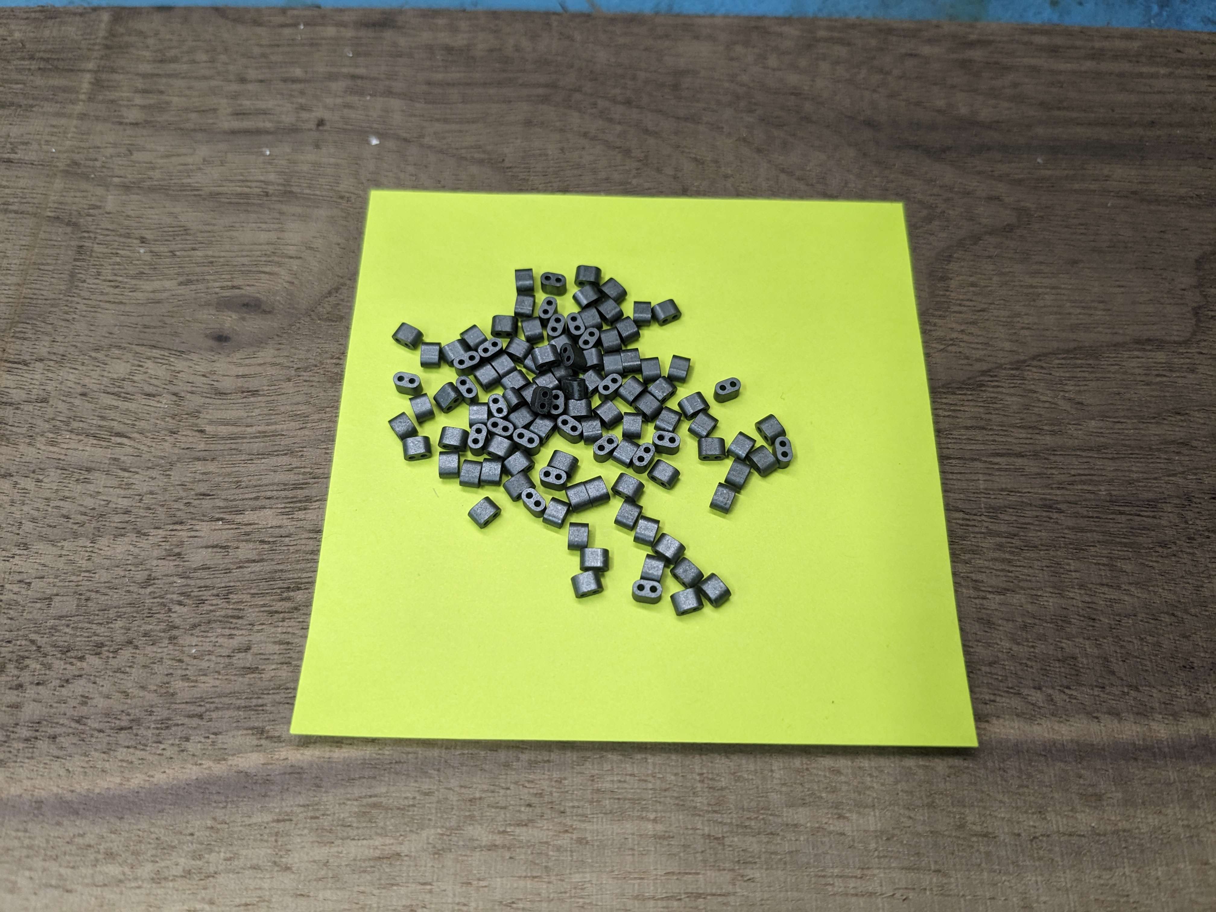 Photograph of a bunch of dual hole torroids