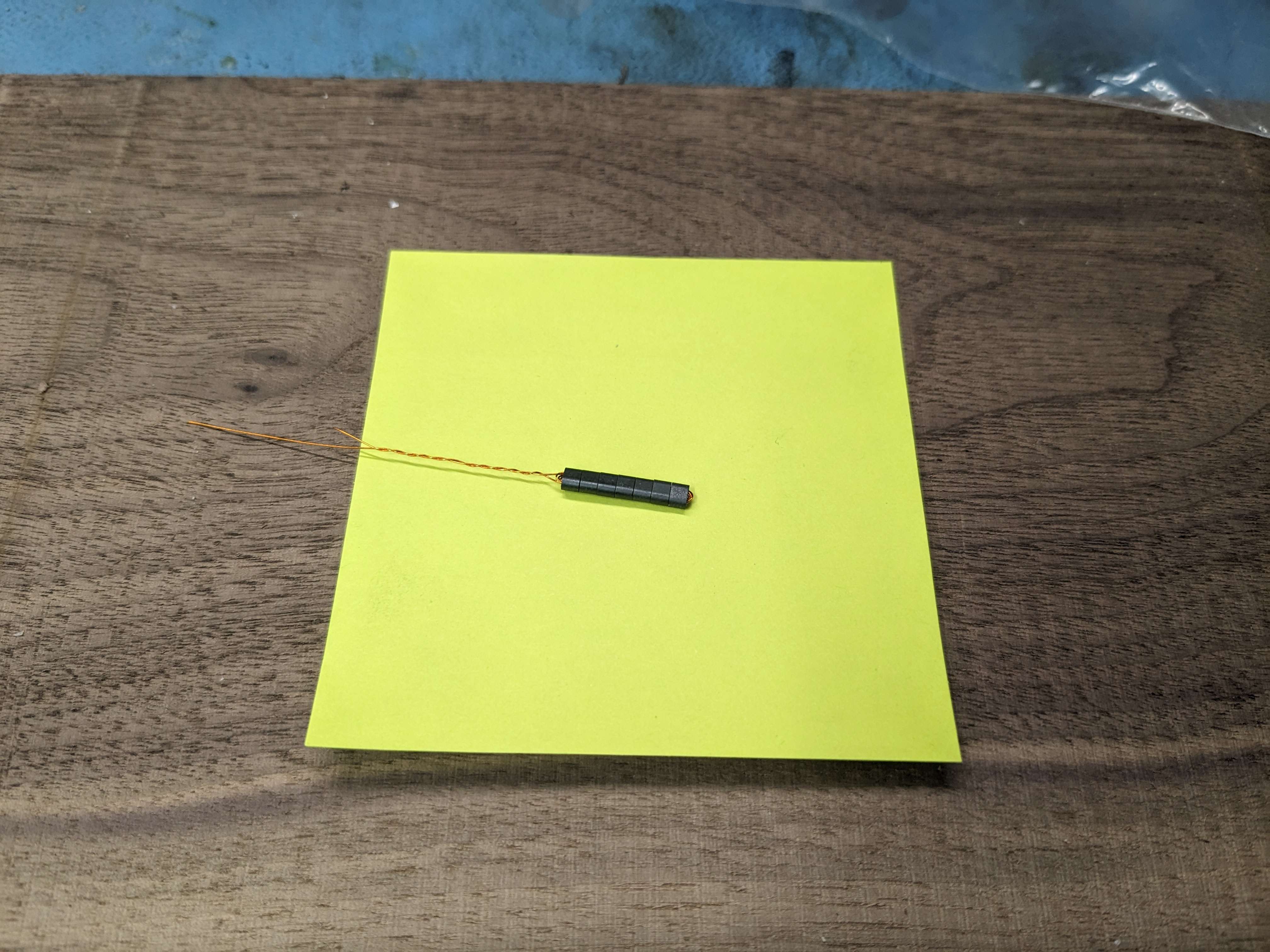 Photo showing several cores held together by a coil wound through them