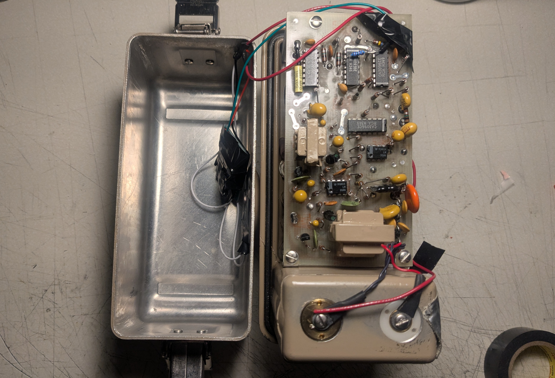 The same meter, opened up and with some extra wires.